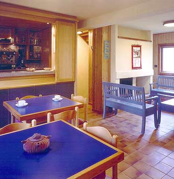 Inner view of the living room in the Rifugio L'Ermitage