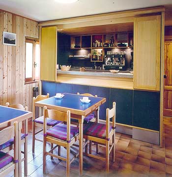 Inner view of the living room in the Rifugio L'Ermitage